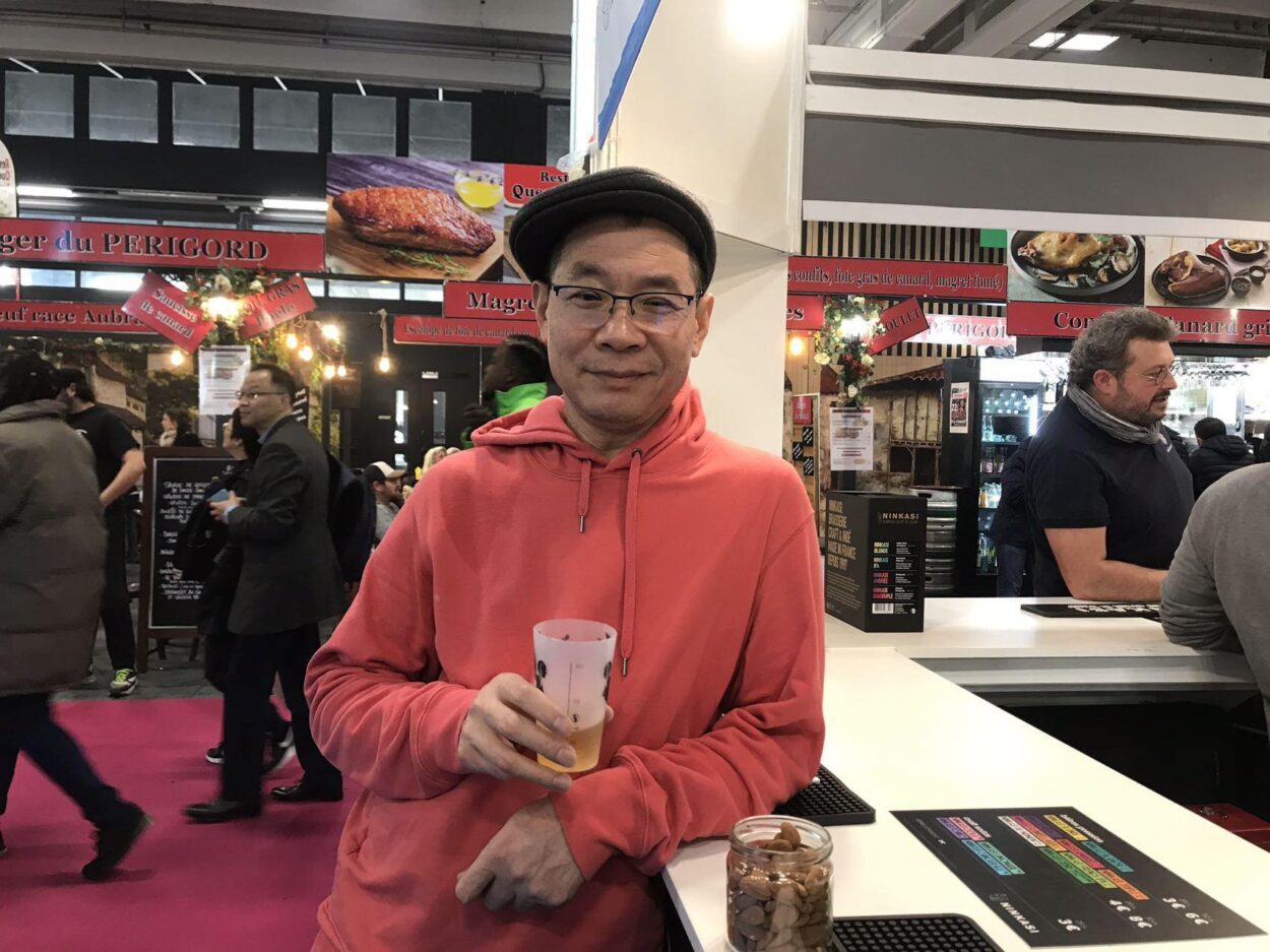 Xavier Chen with a drink.