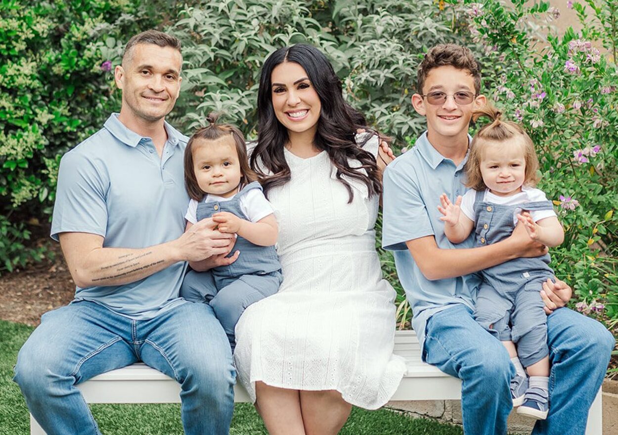 Amanda Bialack-Stewart family photo with husband, teen son and twin baby boys.