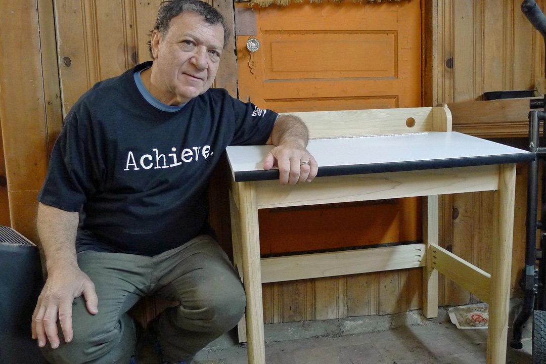 Rich Gopen sitting at a desk.