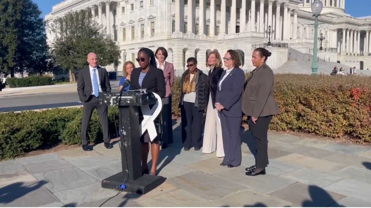 Dr. Sydney Barned in front of the United States Capitol.